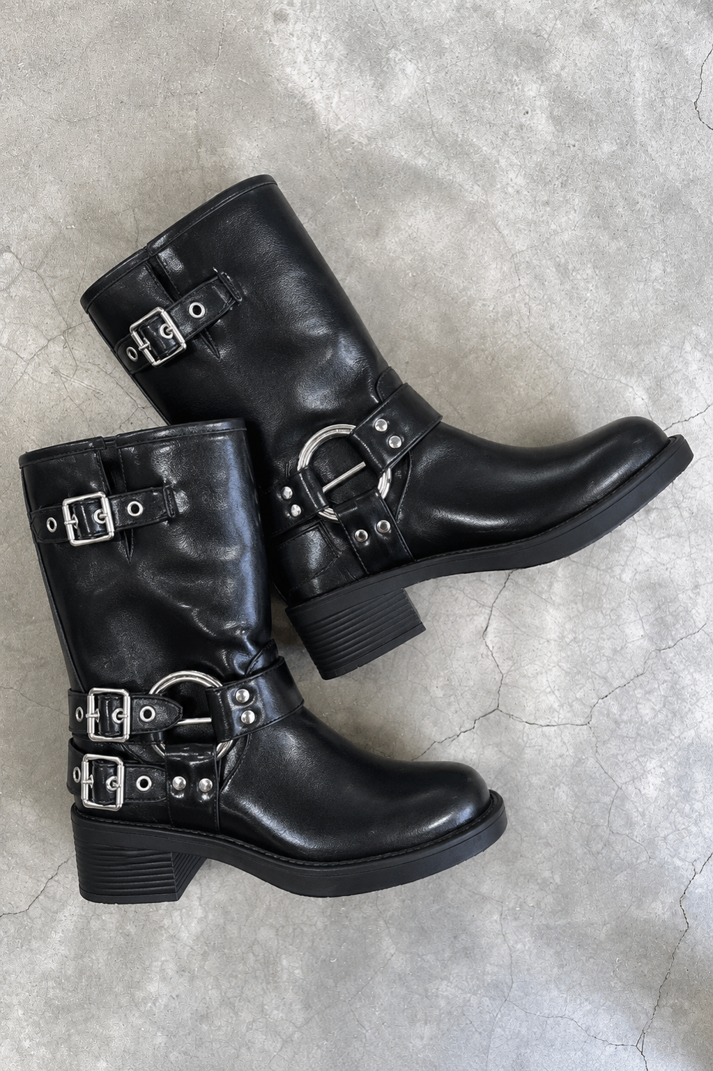 Black mid-calf harness buckle biker boots for women