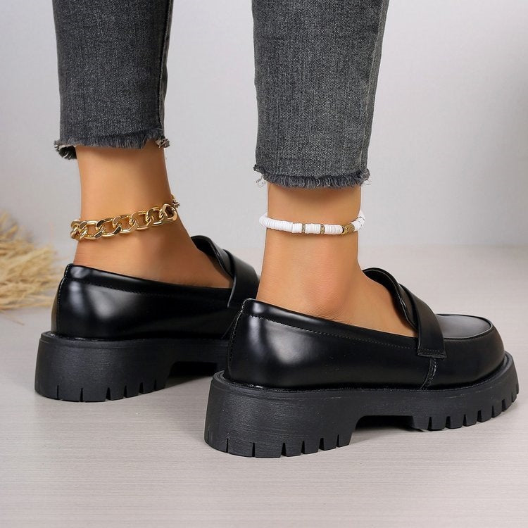 Black glossy lug sole chunky loafers for women