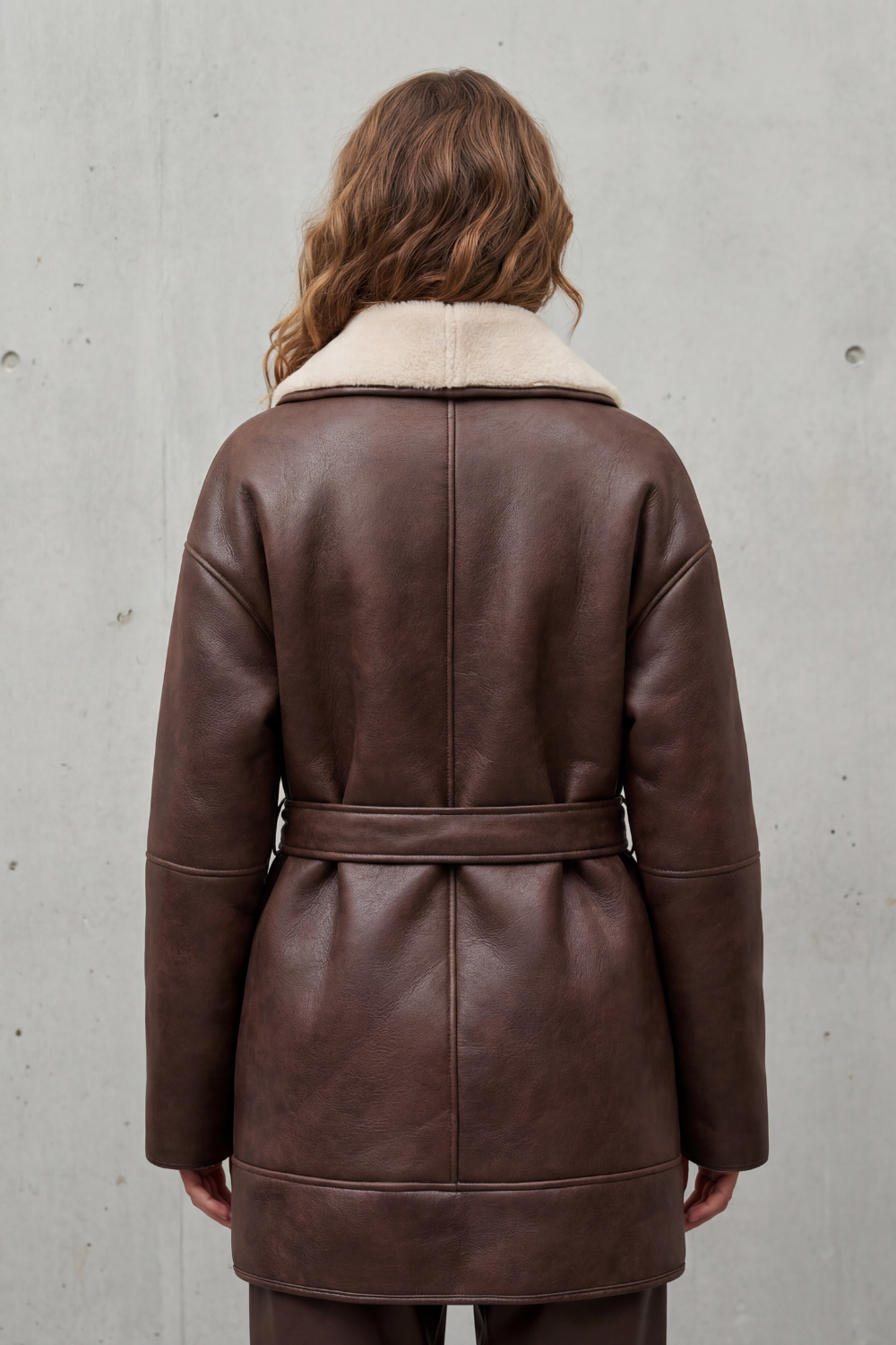 Oversized sherpa-lined leather belted coat for women