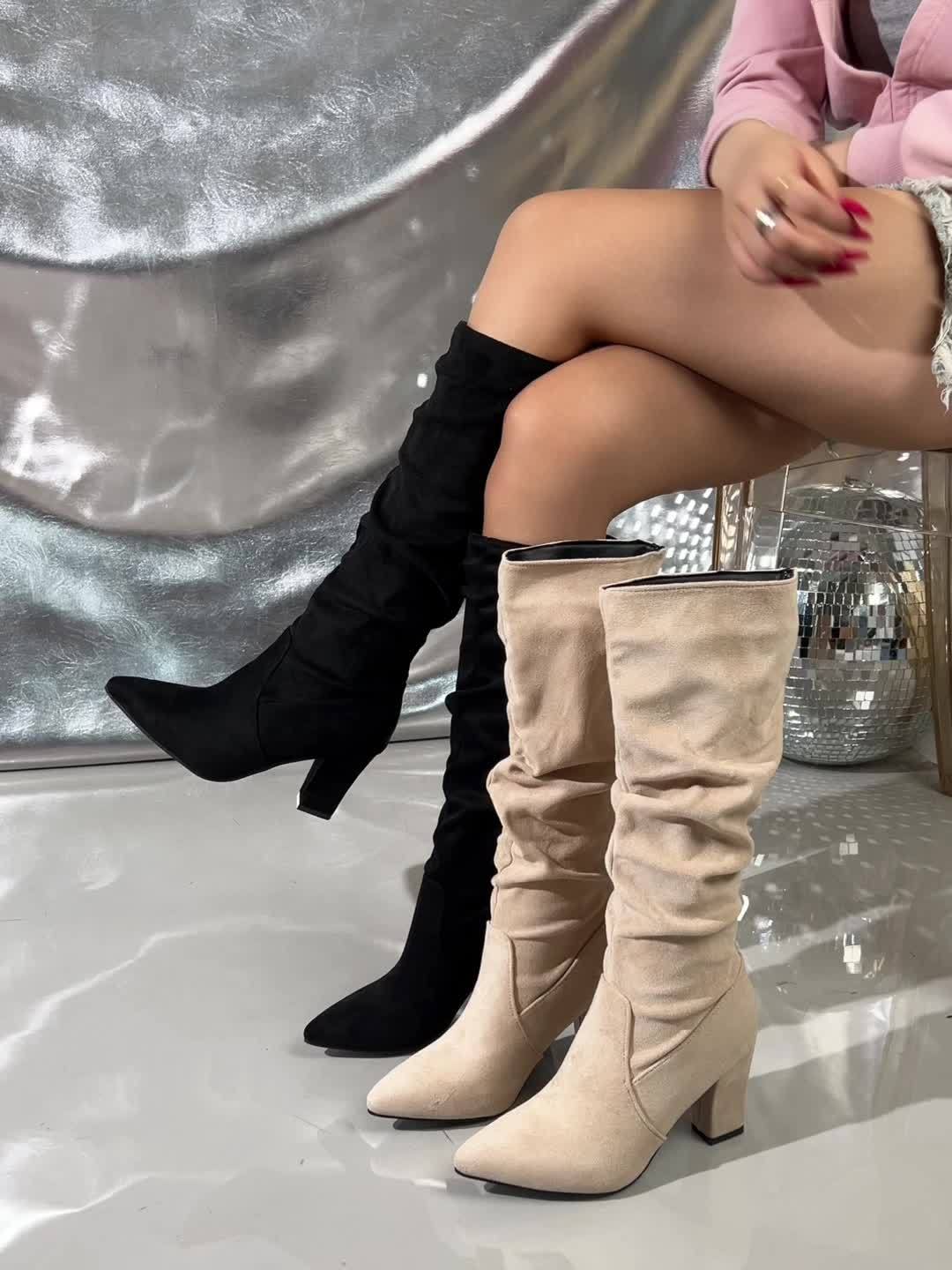 Black knee-high slouch boots with block heel for women
