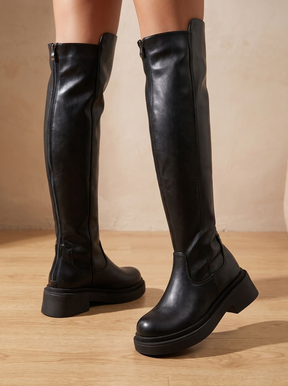 Chunky over-the-knee boots in black or brown for women