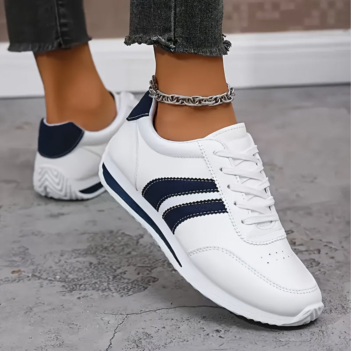 Striped leather-look sneakers for women