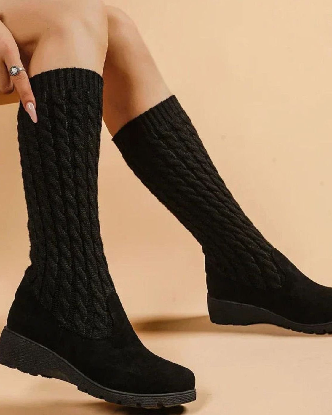 Cable knit knee-high boots in black for women