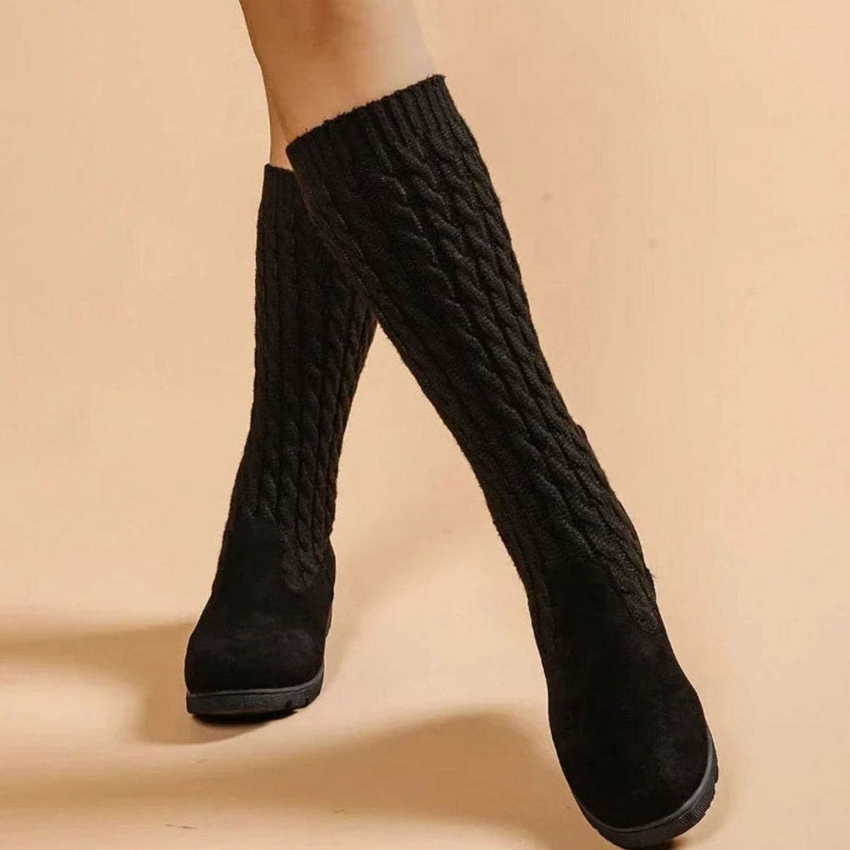 Cable knit knee-high boots in black for women