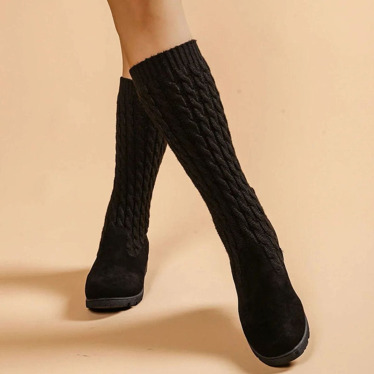 Cable knit knee-high boots in black for women