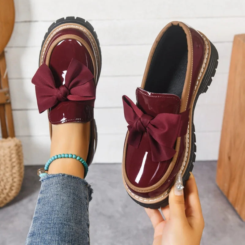 Big bow patent-look platform loafers for women