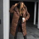 Long quilted hooded coat in brown for women