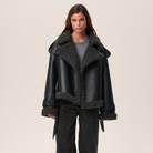 Belted shearling-look aviator jacket in black for women