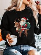 Christmas sweater with Santa and reindeer print for women