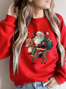 Christmas sweater with Santa and reindeer print for women