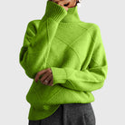 Oversized turtleneck sweater in green for women