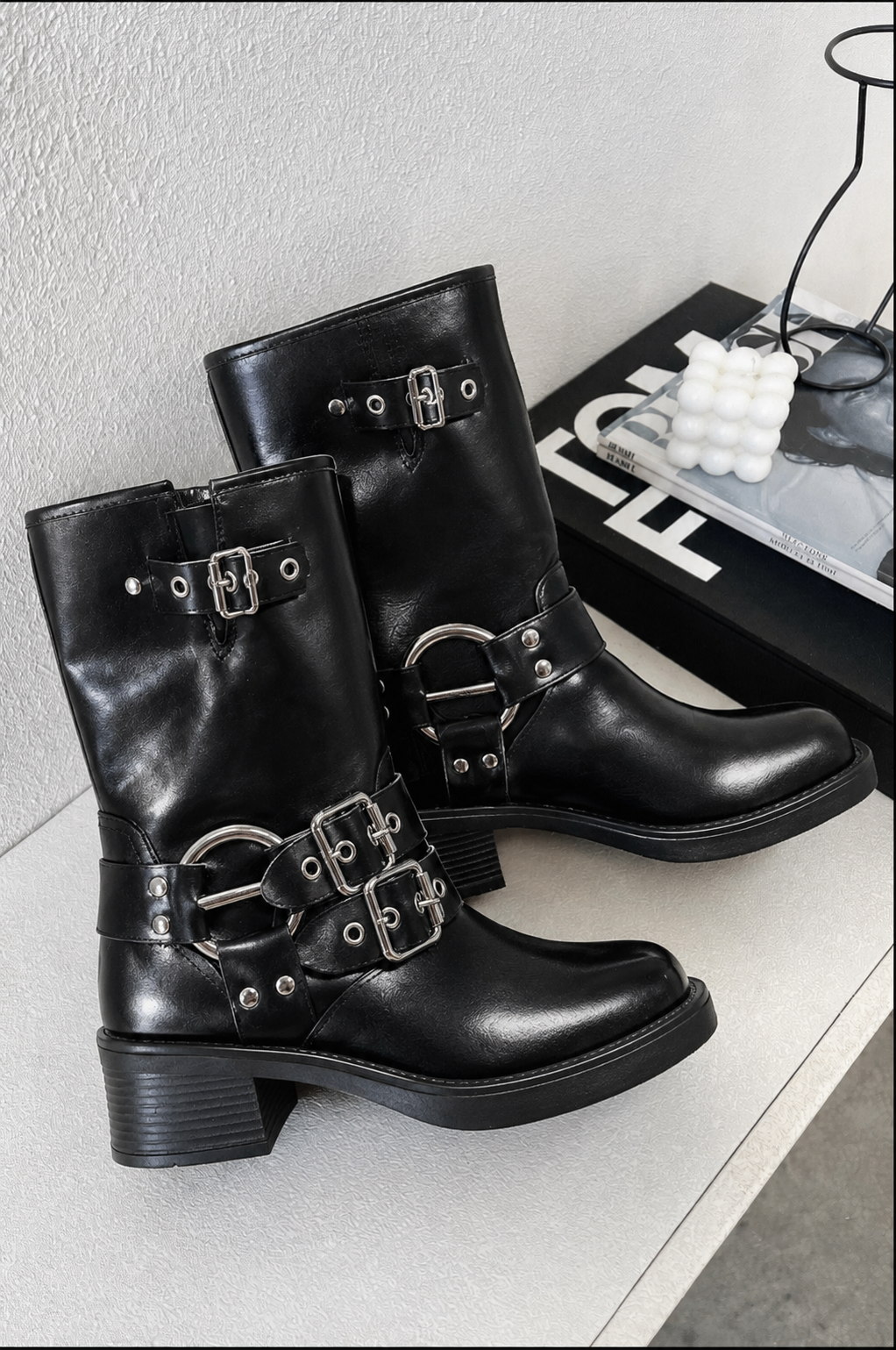 Black mid-calf harness buckle biker boots for women