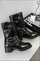 Black mid-calf harness buckle biker boots for women