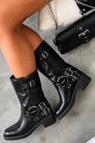 Black mid-calf harness buckle biker boots for women