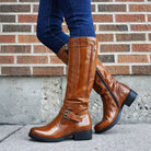 Glossy buckle knee-high boots in brown for women