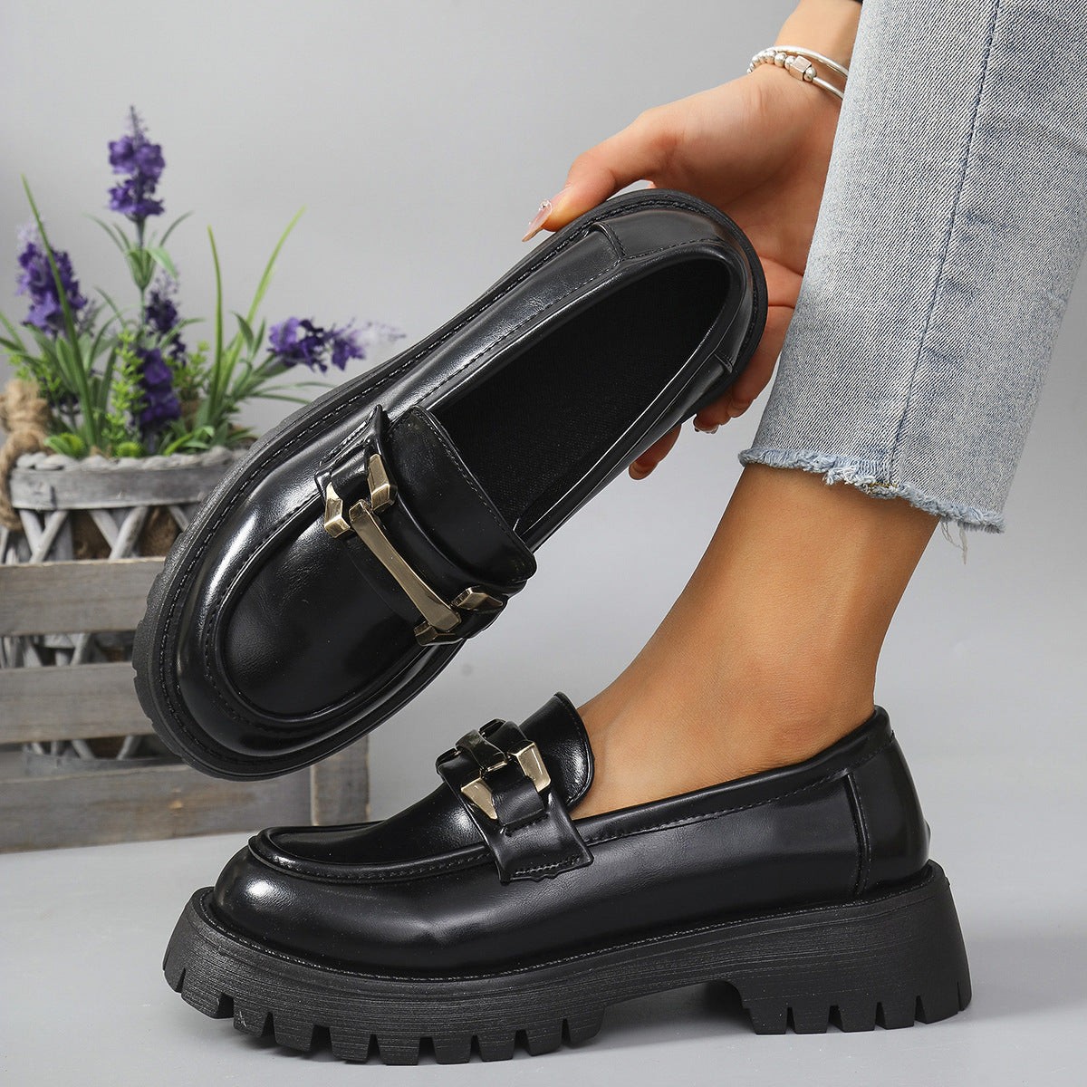 Black metal bar cleated chunky loafers for women