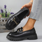 Black metal bar cleated chunky loafers for women