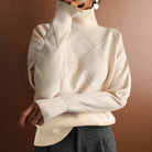 Oversized turtleneck sweater in white for women