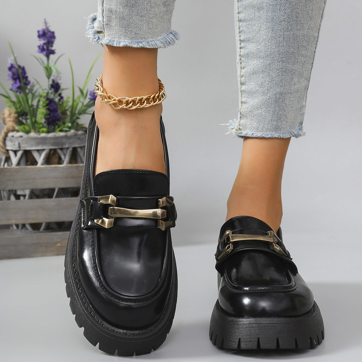Black metal bar cleated chunky loafers for women