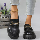 Black metal bar cleated chunky loafers for women