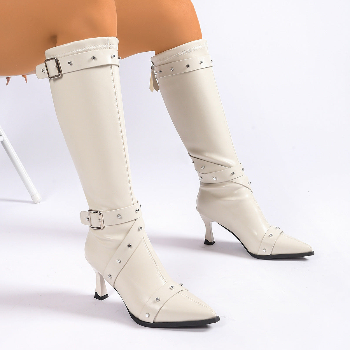 Pointed toe knee-high boots with buckle straps for women