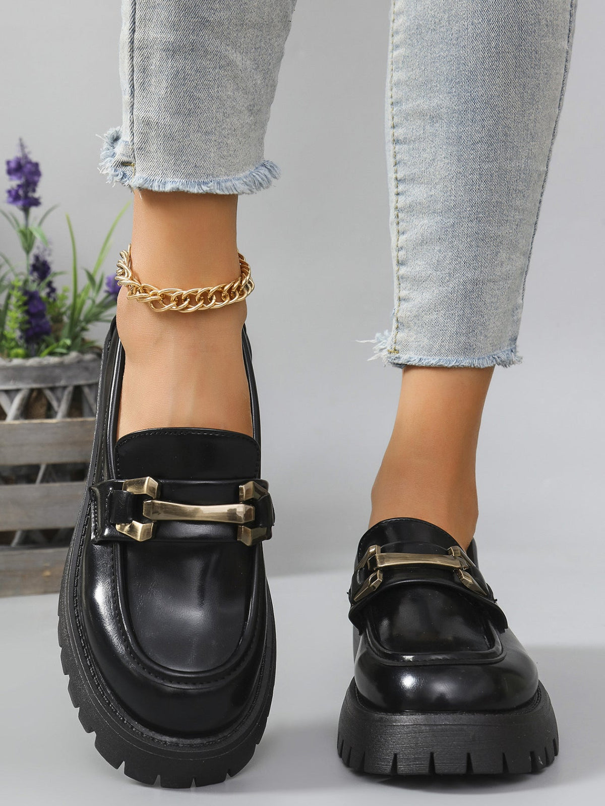 Black metal bar cleated chunky loafers for women