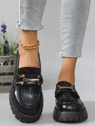 Black metal bar cleated chunky loafers for women