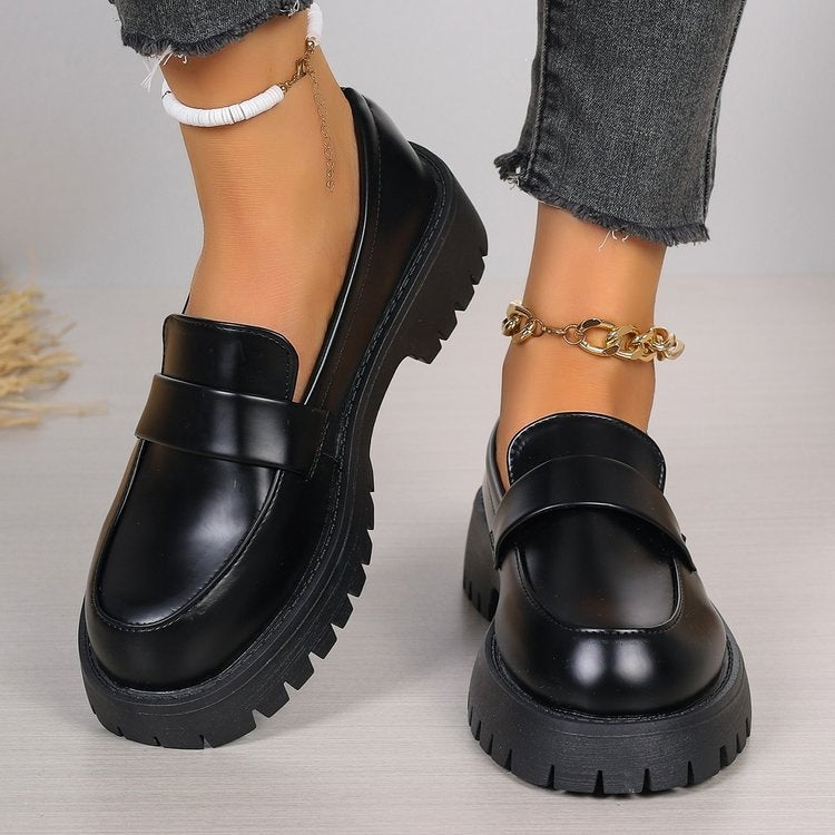 Black glossy lug sole chunky loafers for women