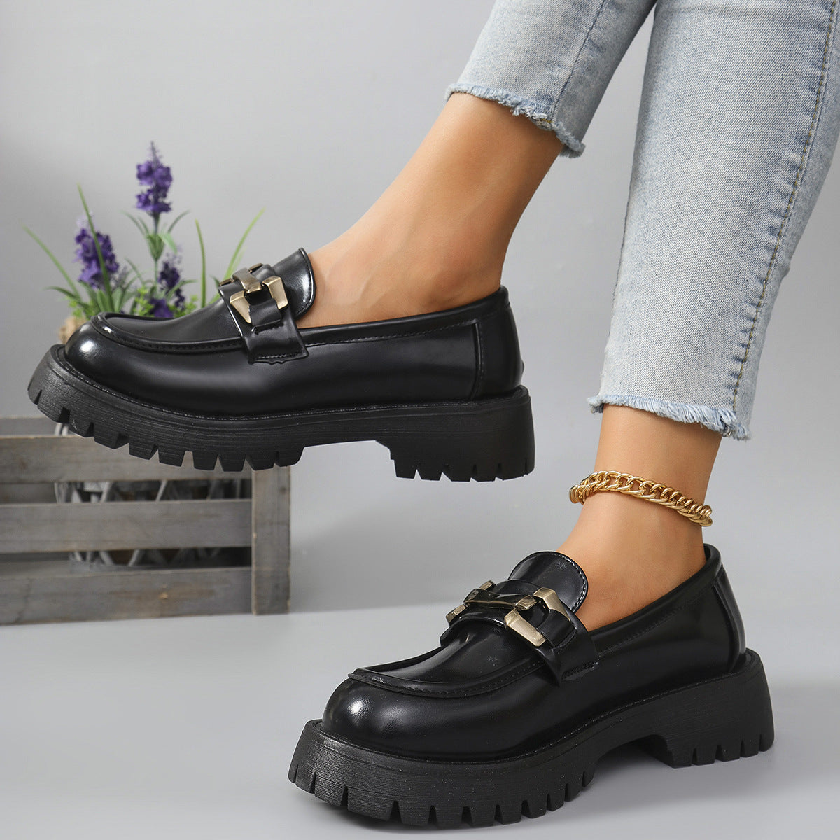 Black metal bar cleated chunky loafers for women