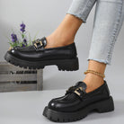 Black metal bar cleated chunky loafers for women