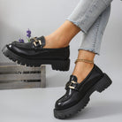 Black metal bar cleated chunky loafers for women