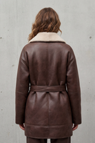 Oversized sherpa-lined leather belted coat for women