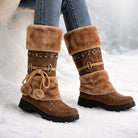 Plush mid-calf snow boots with faux-fur cuff and pom-poms for women