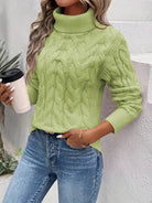 Cable knit turtleneck sweater in green for women