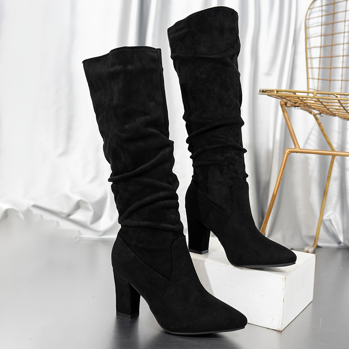 Black knee-high slouch boots with block heel for women