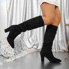Black knee-high slouch boots with block heel for women