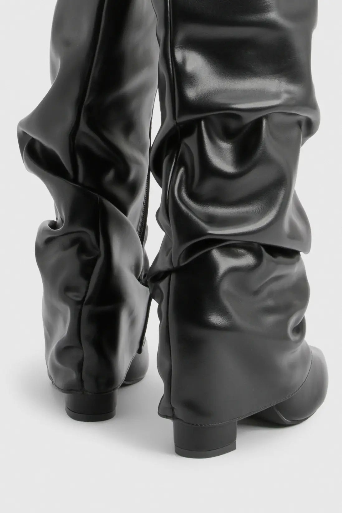 Pointed toe knee-high slouch boots for women