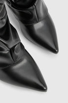 Pointed toe knee-high slouch boots for women