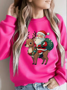 Christmas sweater with Santa and reindeer print for women