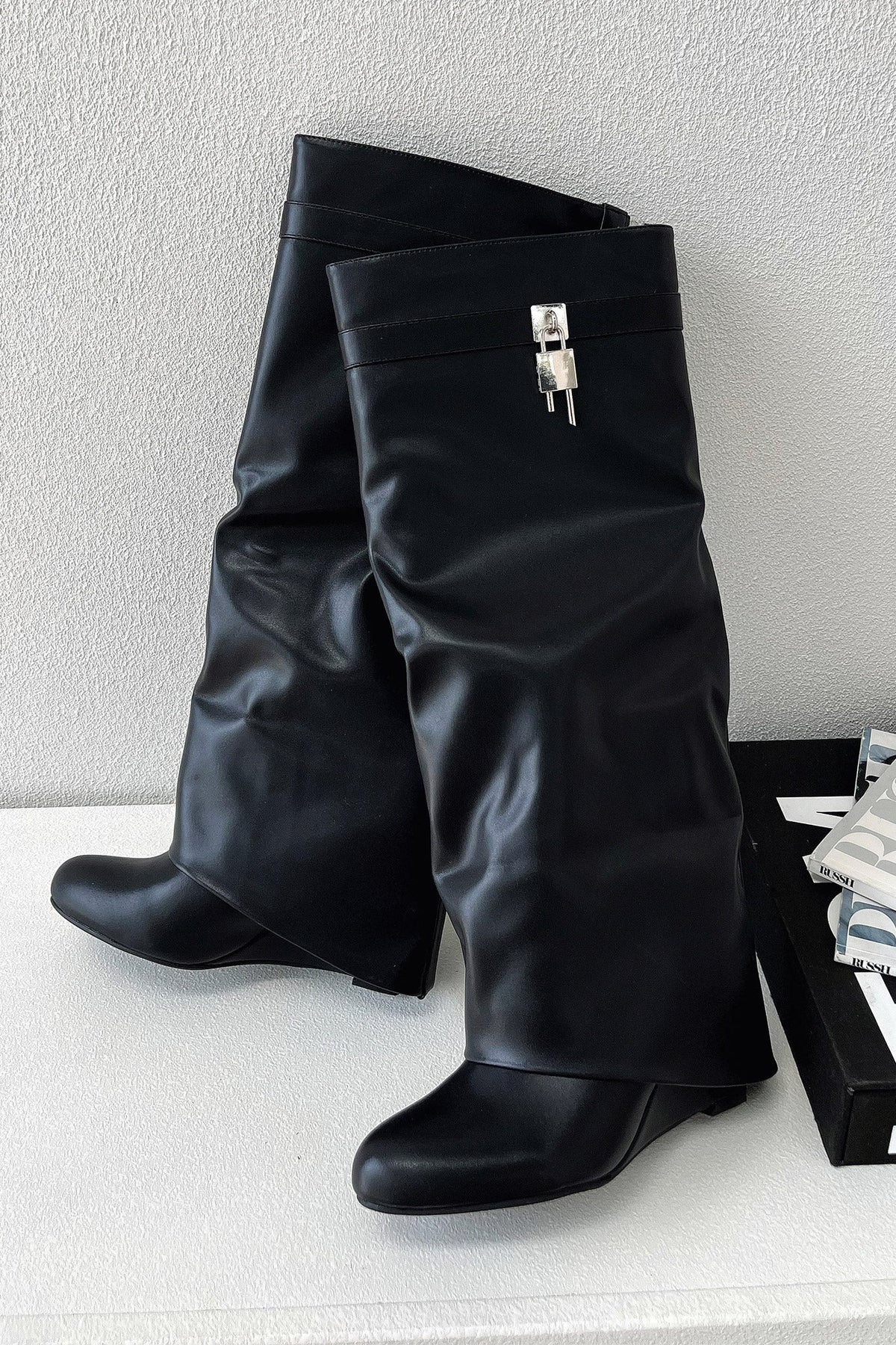 Knee-high boots black women