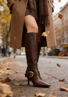 Buckled pointed toe knee-high boots for women