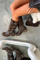 Harness buckle knee-high boots in brown for women