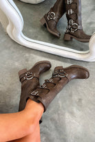 Harness buckle knee-high boots in brown for women