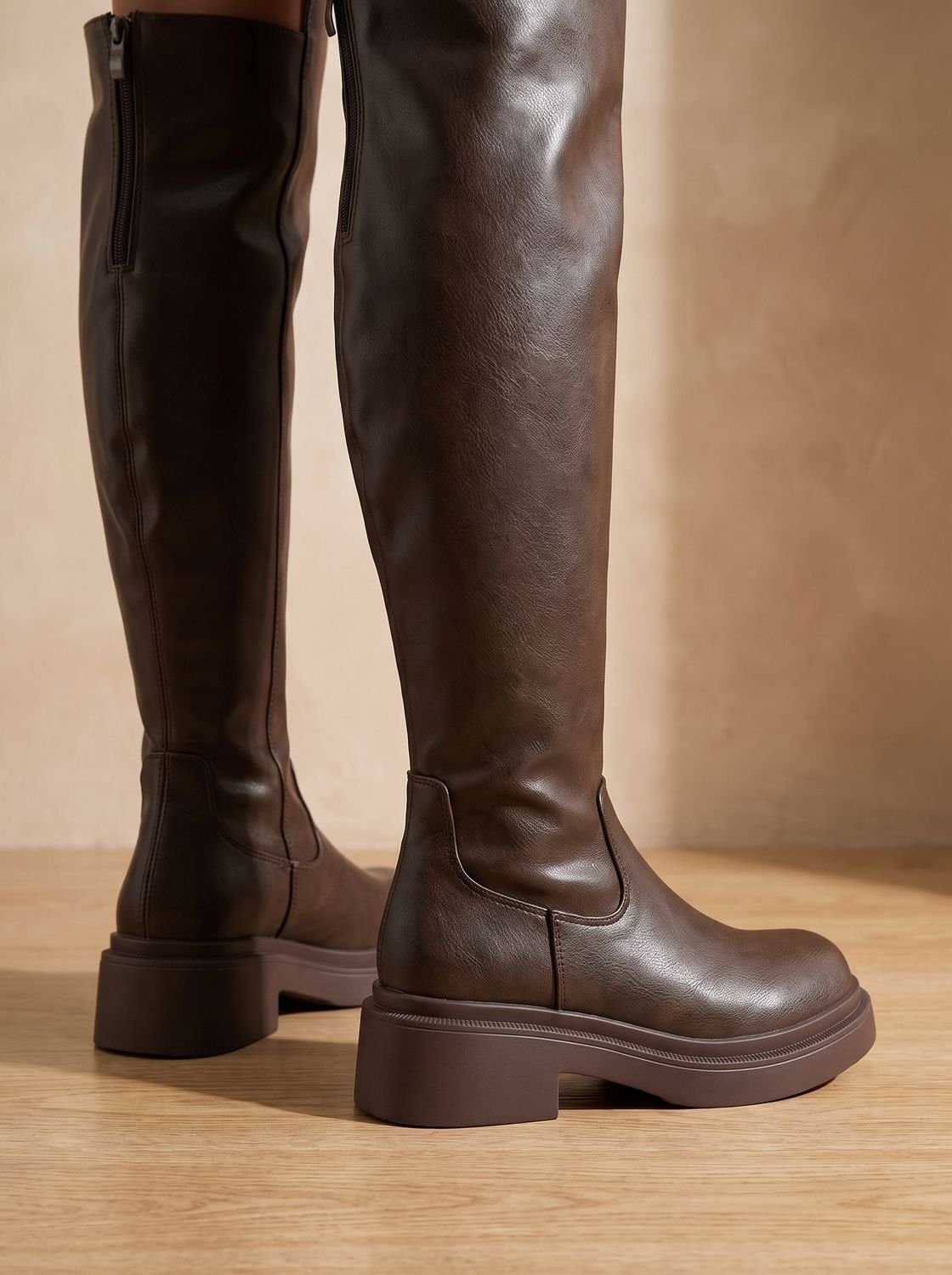 Chunky over-the-knee boots in black or brown for women