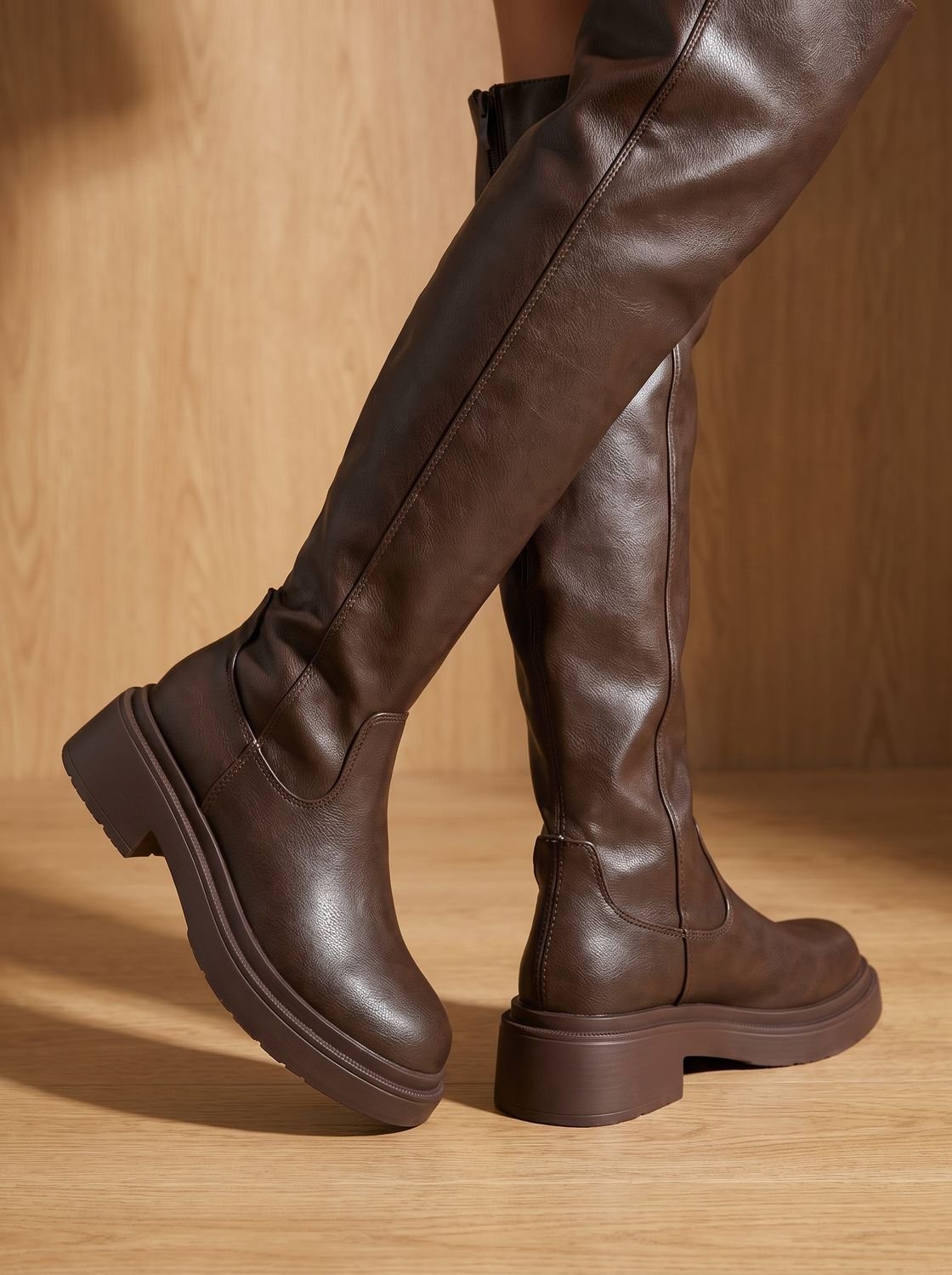 Chunky over-the-knee boots in black or brown for women
