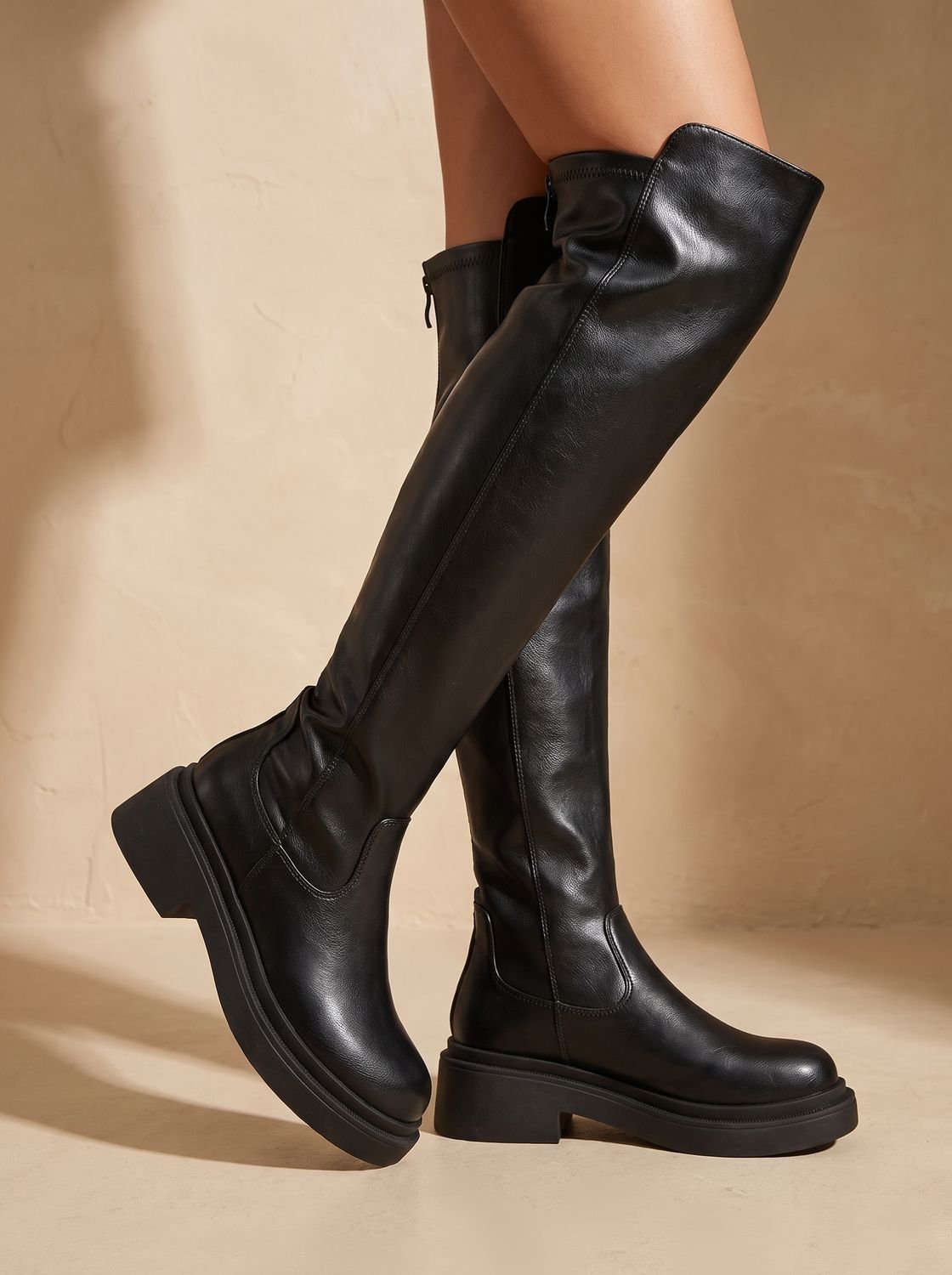 Chunky over-the-knee boots in black or brown for women