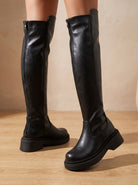 Chunky over-the-knee boots in black or brown for women