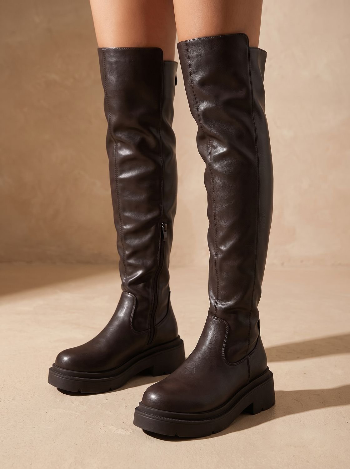 Chunky over-the-knee boots in black or brown for women