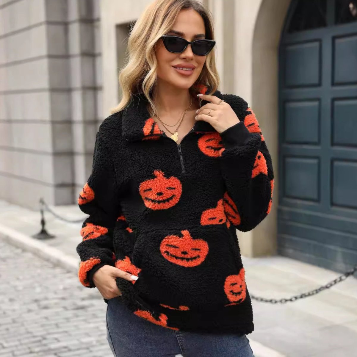 Pumpkin print fleece half-zip pullover in black for women