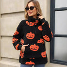 Pumpkin print fleece half-zip pullover in black for women